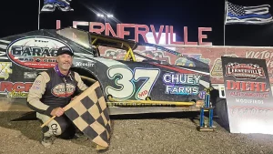 Jeremiah Shingledecker celebrating victory after winning a 2023 feature race at Lernerville Speedway.
